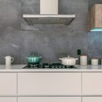 green and white casseroles on white oven